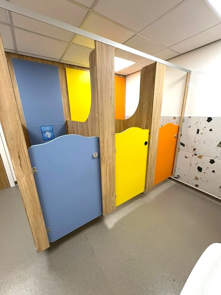 Rainbow four-colour school toilet cubicles for primary washrooms