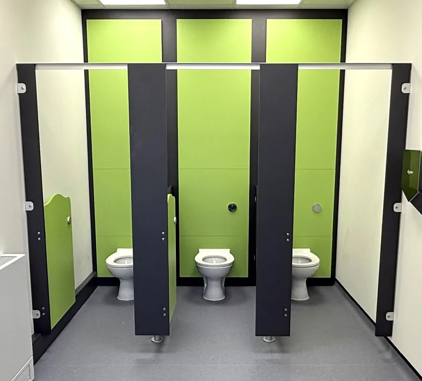 Rainbow school toilet cubicles in lime and charcoal