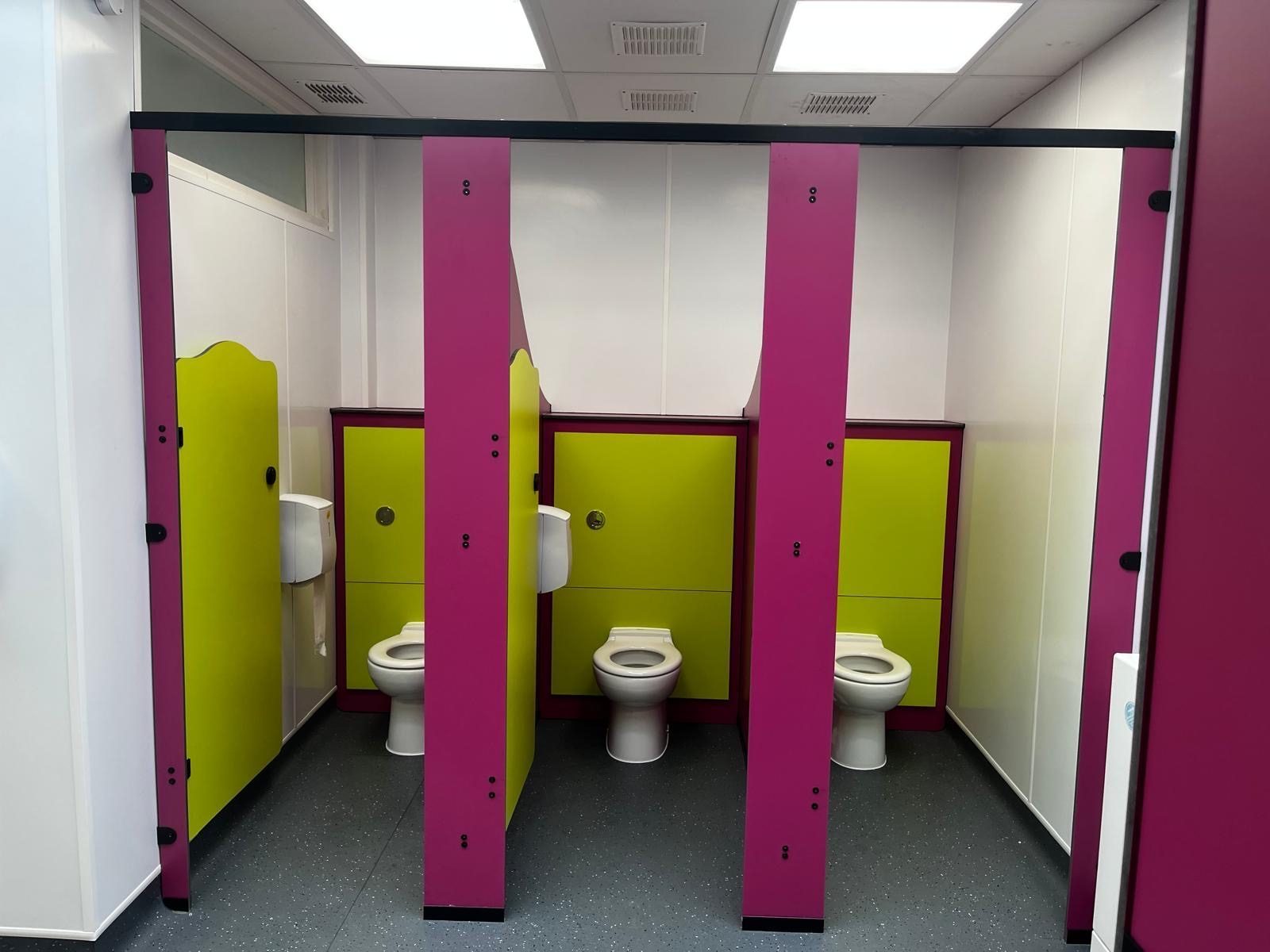 Rainbow school toilet cubicles