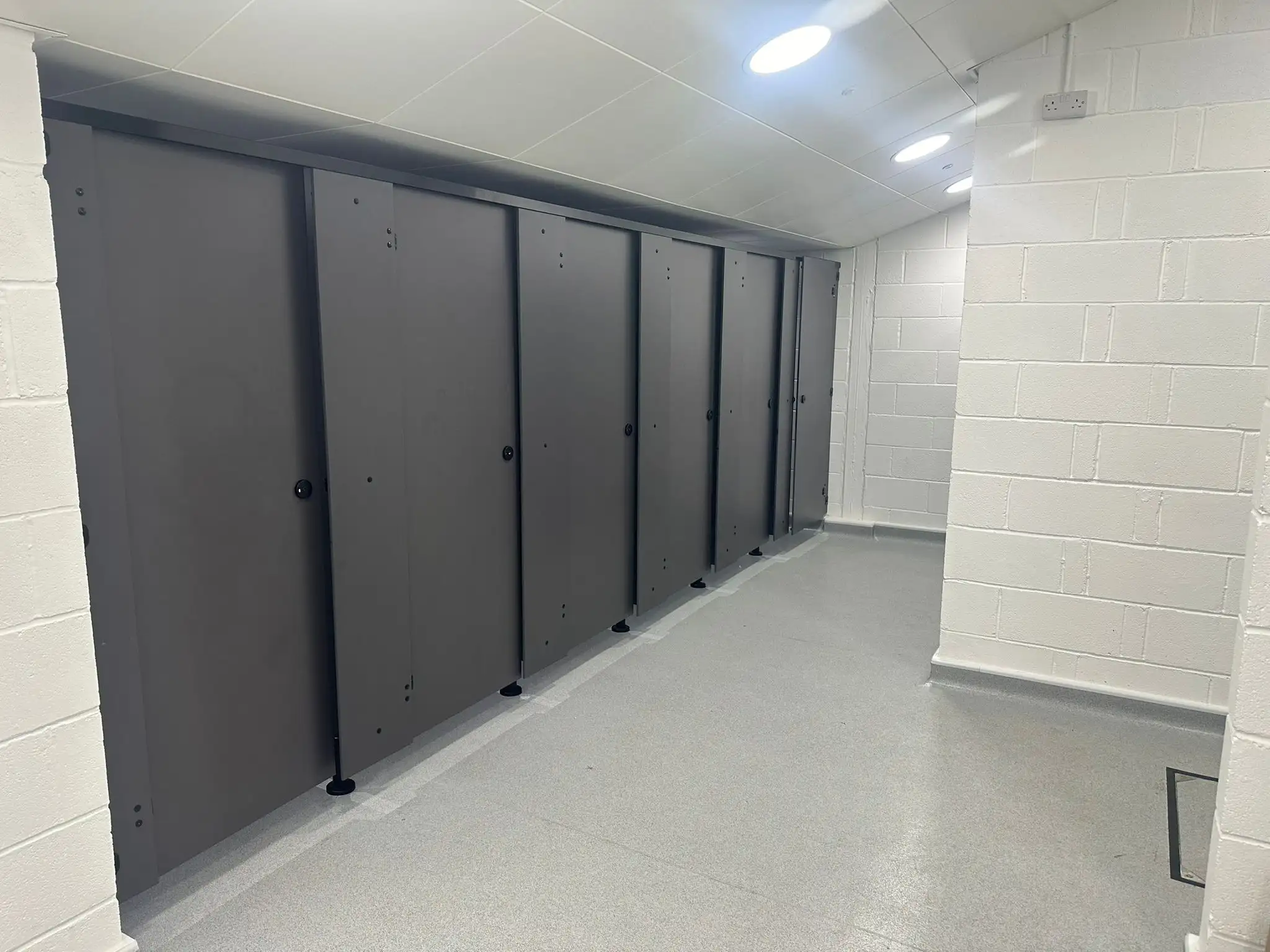 Retail and public space toilet cubicles made with Pfleiderer panels